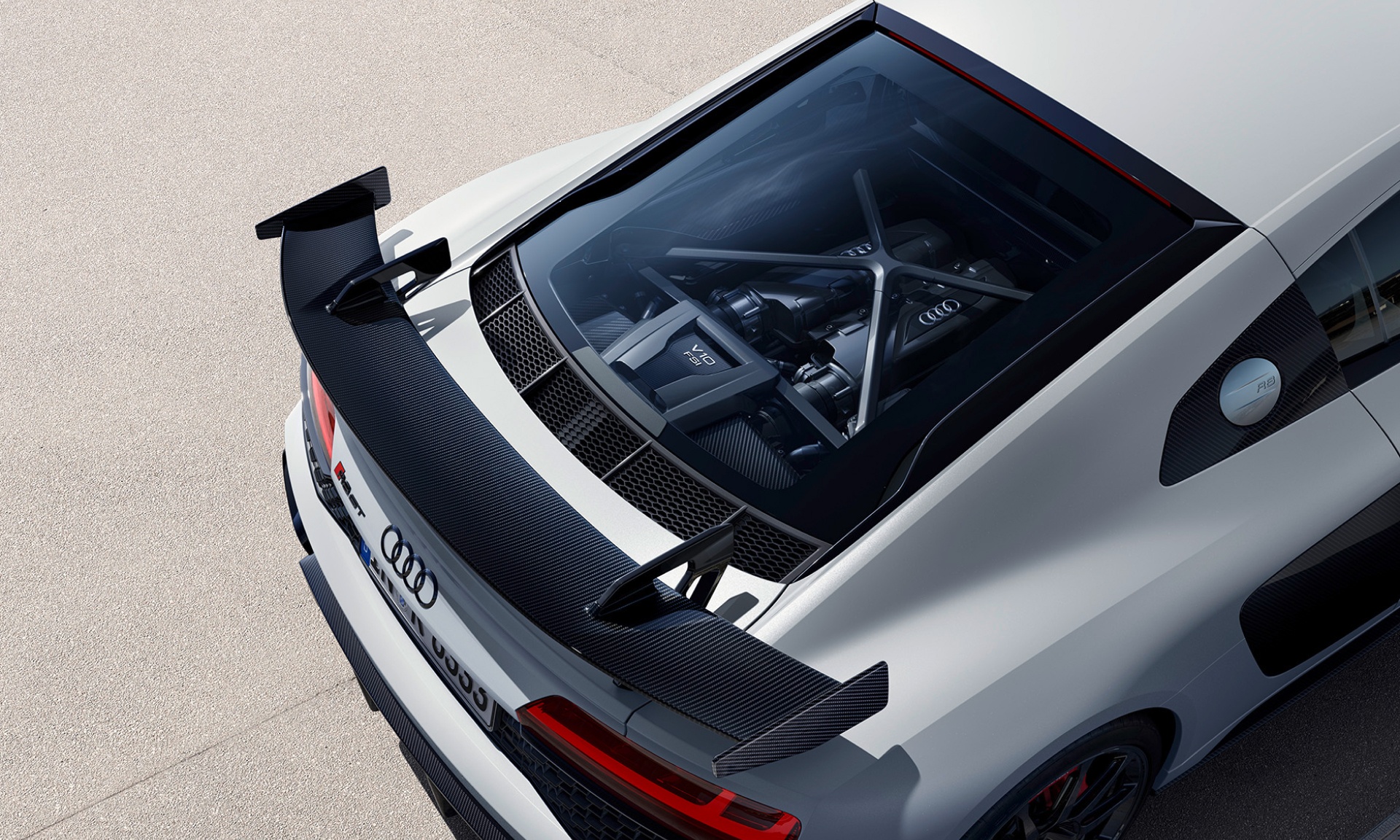 Bird’s eye view of the rear and engine compartment of the Audi R8 GT.